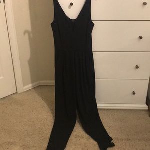 Black V neck jumpsuit.